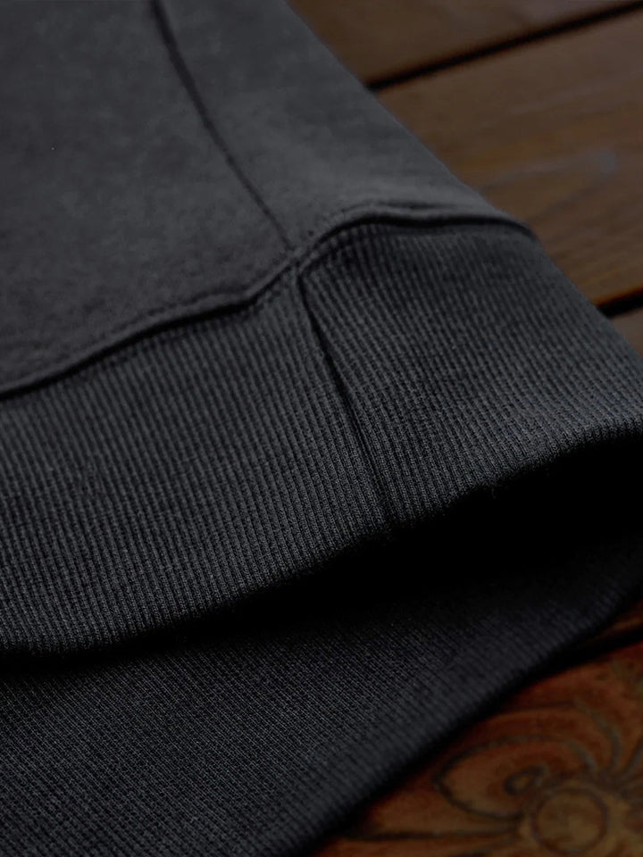 Pullover hoodie with brushed lining and contrast elbow patches