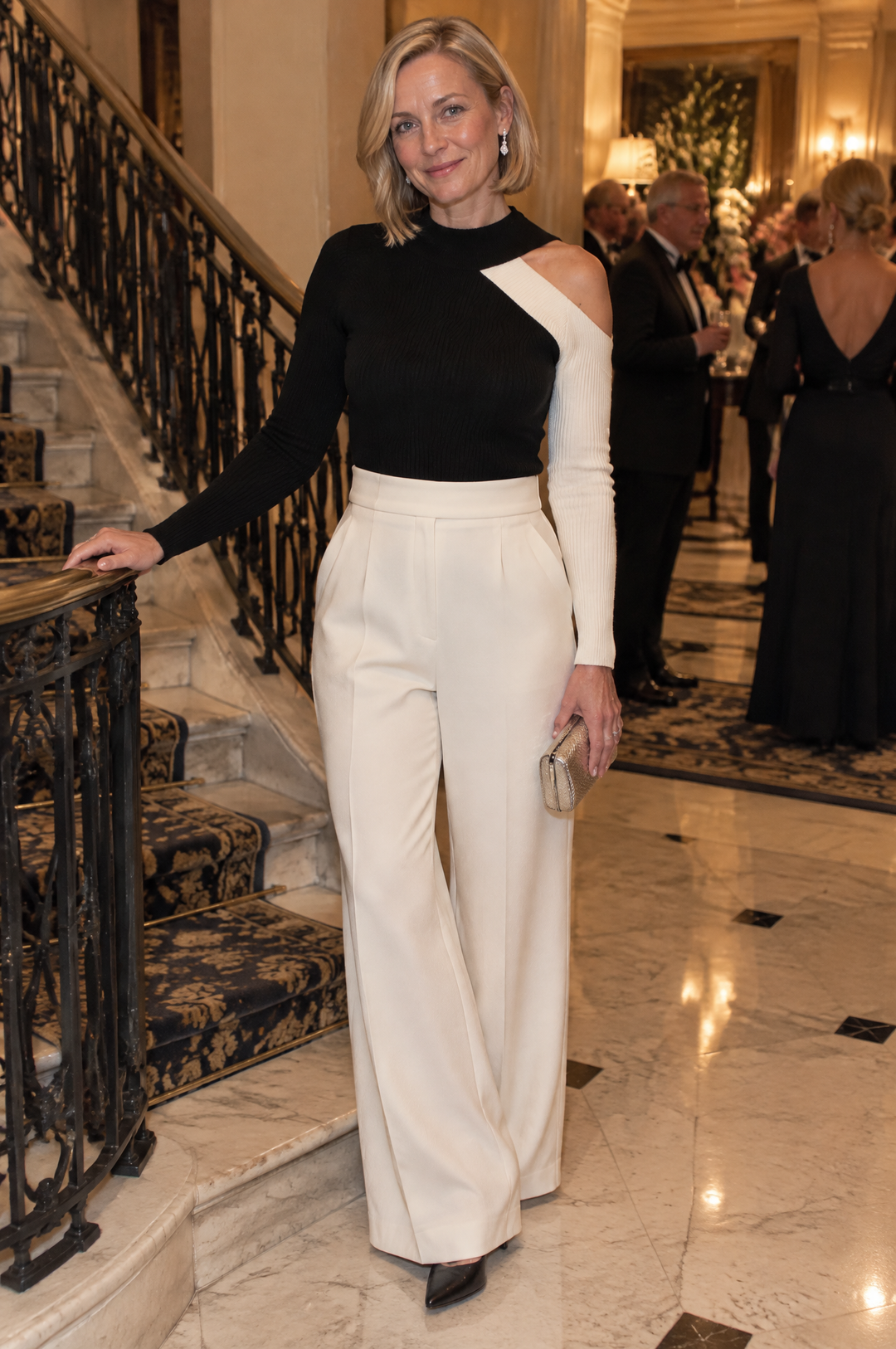 Mock Neck Knit Top With Asymmetric Cut-Out And Contrast Off-Shoulder Sleeve